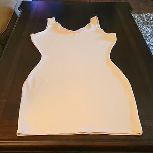 Spanx shaping slip. Not new, but never worn.